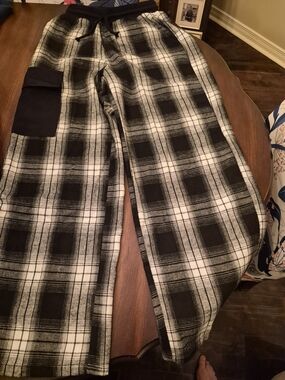 Girls Black and White Plaid Lounge Pants Plus Black Long Sleeve Top.